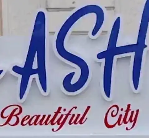 تابلوی رستوران شمالی گیله گل با کلمات آبی رنگ برجسته شامل 'ASH' و متن زیبا و قرمز رنگ 'Beautiful City' بر روی پس زمینه سفید.