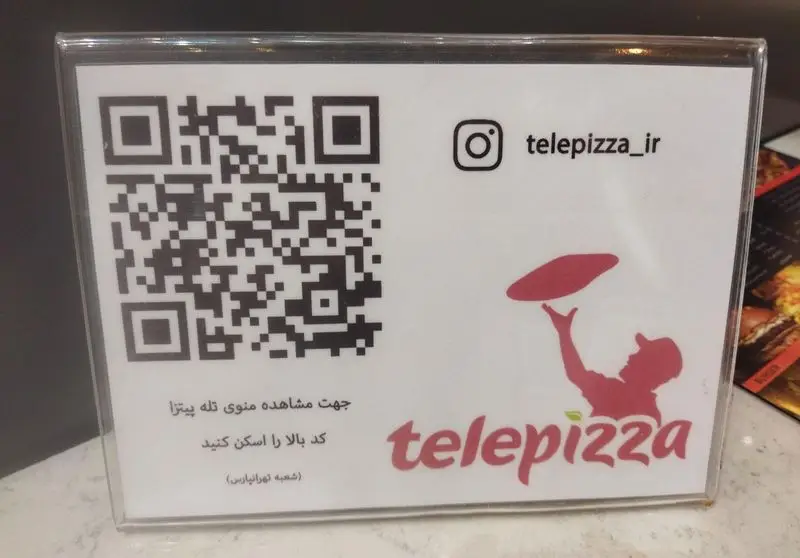 تله پیتزا تهرانپارس: منو دیجیتال با QR کد قابل اسکن و صفحه اینستاگرام telepizza_ir جهت مشاهده منو و تخفیفات پیتزا.