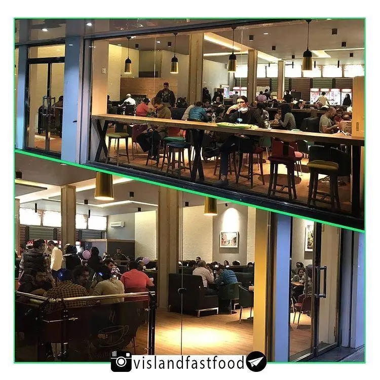 فضای داخلی مدرن و دلنشین فست فود و کافه ویسلند، با مشتریانی در طبقات مختلف، ارائه دهنده تجربه‌ای عالی برای صرف غذا.