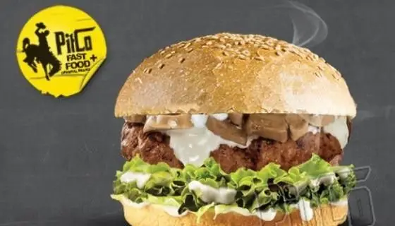 تصویر همبرگر ویژه فست فود پیتکو PitCo با نان کنجدی، پتی گوشت، قارچ، کاهو تازه و سس سفید.