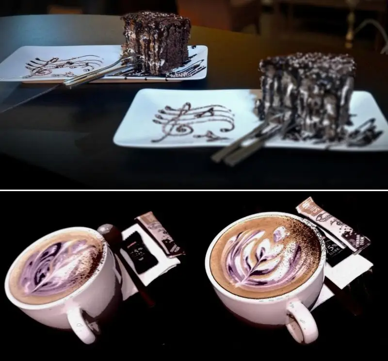کیک شکلاتی و قهوه لاته آرت با طرح برگ در کافه برلین. ترکیبی هنرمندانه از دسر و نوشیدنی گرم با تزئینات موسیقی روی بشقاب.