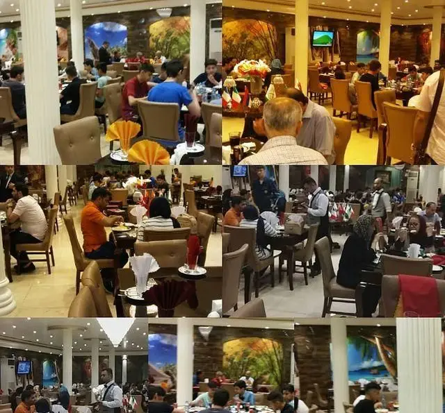 رستوران آرامیس، محیطی شیک و مدرن با دکوراسیون زیبا و مشتریان پرشمار در حال غذاخوری. تجربه غذایی دلپذیر در فضایی آرام و دلنشین.