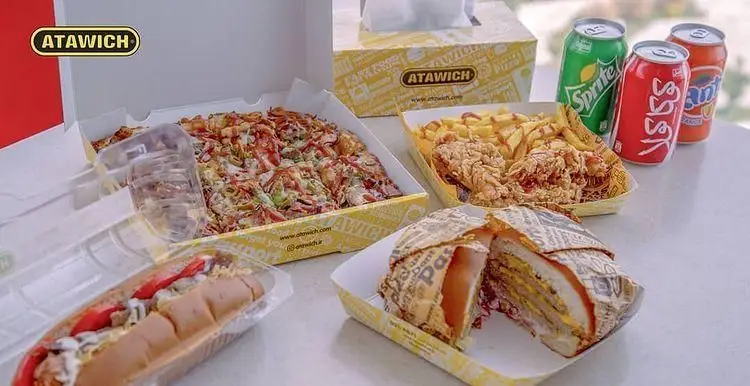 منوی کامل فست فود عطاویچ اکباتان شامل پیتزا، ساندویچ، مرغ سوخاری و نوشیدنی‌های متنوع برای سفارش آنلاین و حضوری.