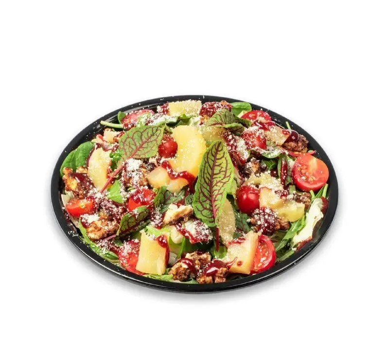 سالاد تازه و پرملات فست فود کامنت با سبزیجات برگ سبز، گوجه گیلاسی، آناناس، گردو، پنیر و سس رژیمی مخصوص.