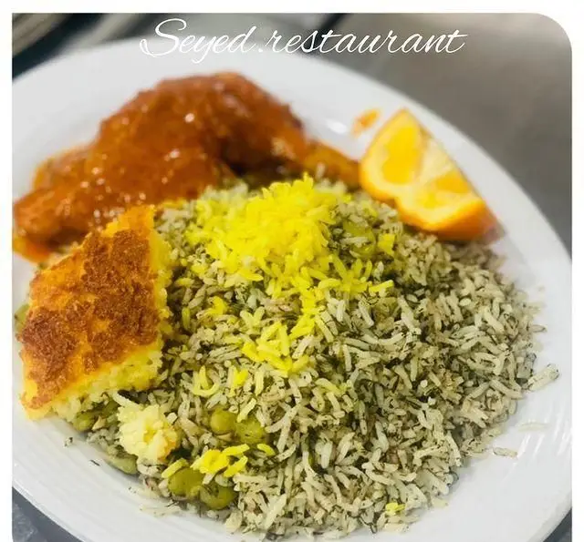 سفارش باقالی پلو با مرغ زعفرانی و ته دیگ خوش طعم از رستوران سید شهرری. غذای اصیل ایرانی و کترینگ حرفه‌ای در شهرری.