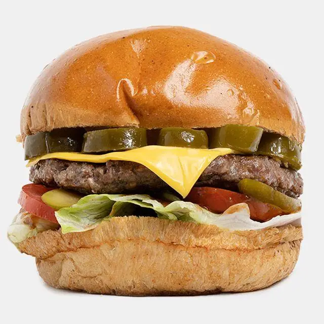 تصویر نزدیک از برگر ژالاپنو باروس برگر. یک ساندویچ همبرگر خوشمزه با پنیر، نان تازه و مخلفات عالی برای سفارش.