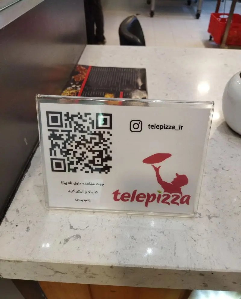 منوی آنلاین و QR کد تله پیتزا شعبه پیروزی برای مشاهده و سفارش آسان انواع پیتزا و فست فود. کد را اسکن کنید و از منو لذت ببرید.