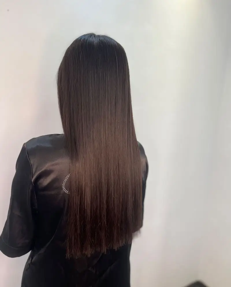 عکس نمونه کار کراتینه و احیای موی بلند و صاف زنانه با شاین و درخشندگی عالی در بهترین سالن تخصصی مراقبت و زیبایی مو