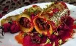 کدو شکم پر مجلسی با مغز گوشت چرخ کرده و سس انار یا لبو، غذای ایرانی اصیل از تهیه غذا رادان. سفارش آنلاین غذاهای خانگی.