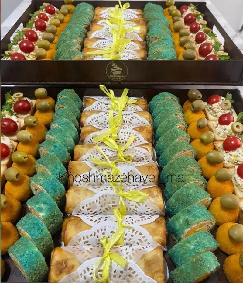 سینی فینگرفود و مزه مجلسی از کیک وشیرینی خوشمزه های ما شامل رول و اردور متنوع برای پذیرایی لوکس مهمانی.